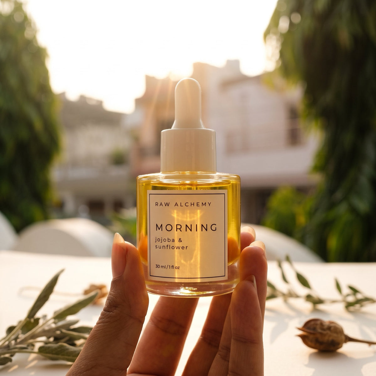Morning face oil glowing in golden morning light