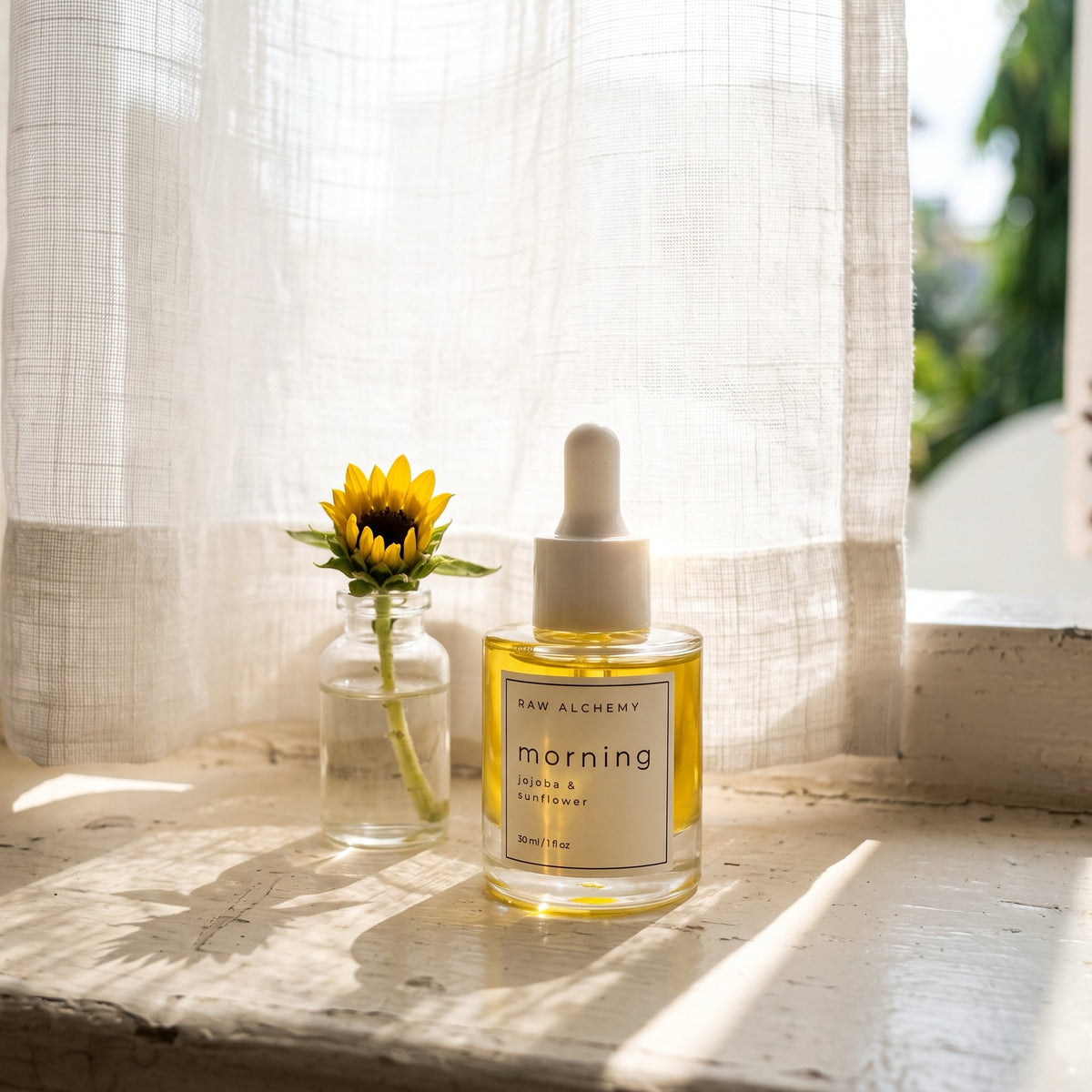 Morning face oil on windowsill with sunflower bouquet